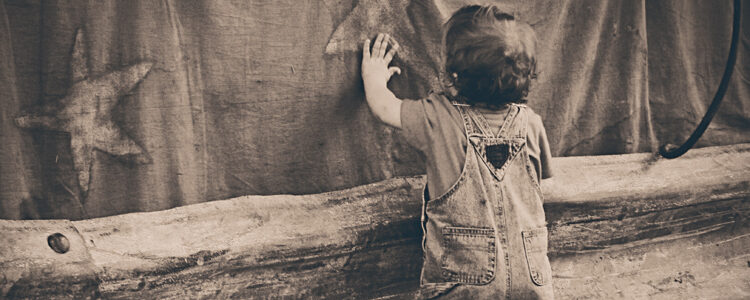 A boy leaning on the Wall A boy leaning on the Wall